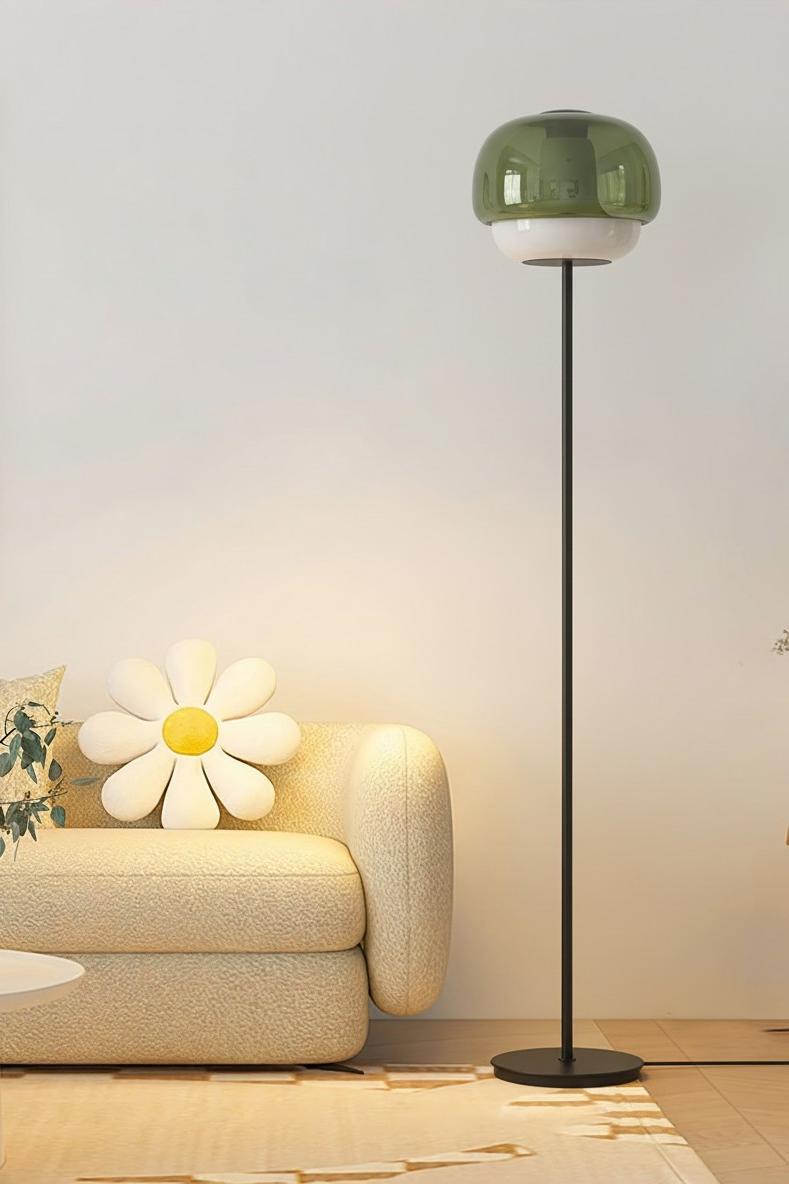 Green Clinco floor lamp beside a sofa