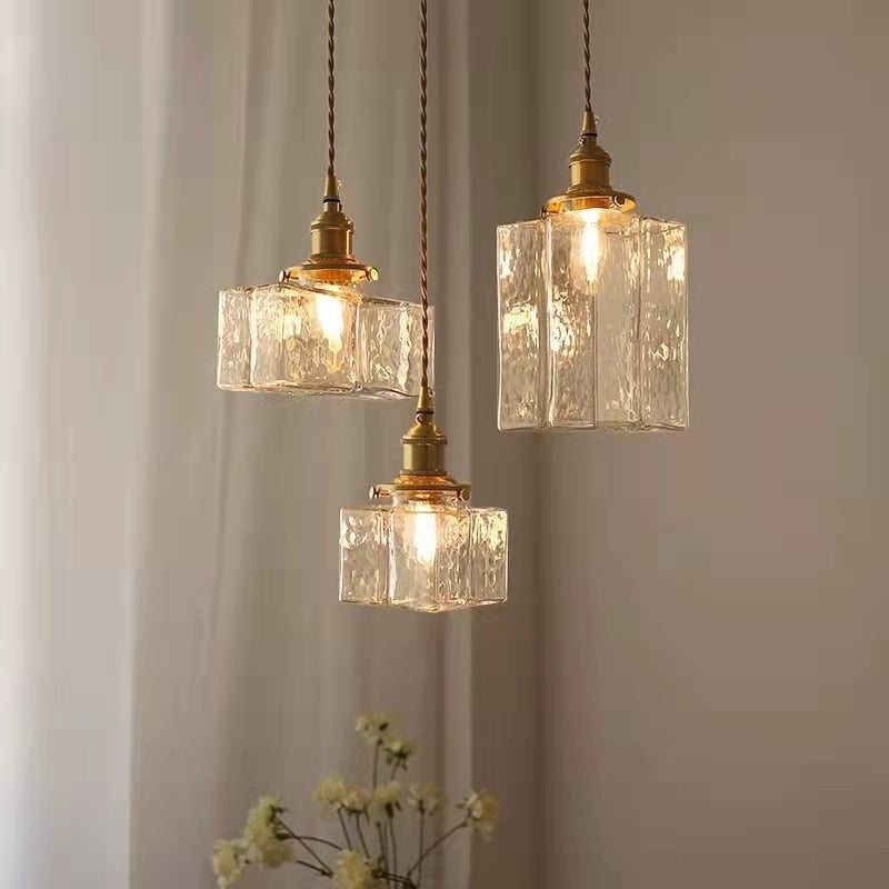 Traditional glass pendant lights hanging together