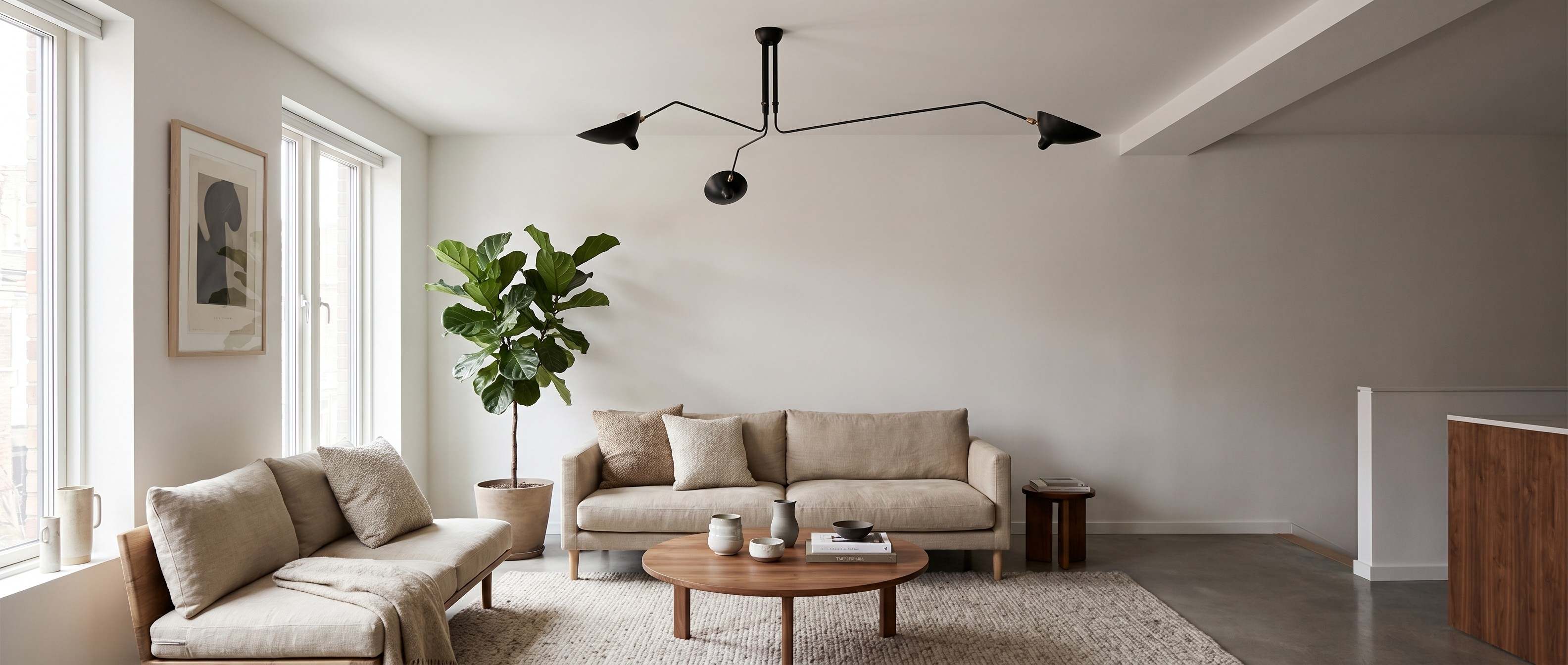 Arclume Arc Ceiling Lamp in a modern living room