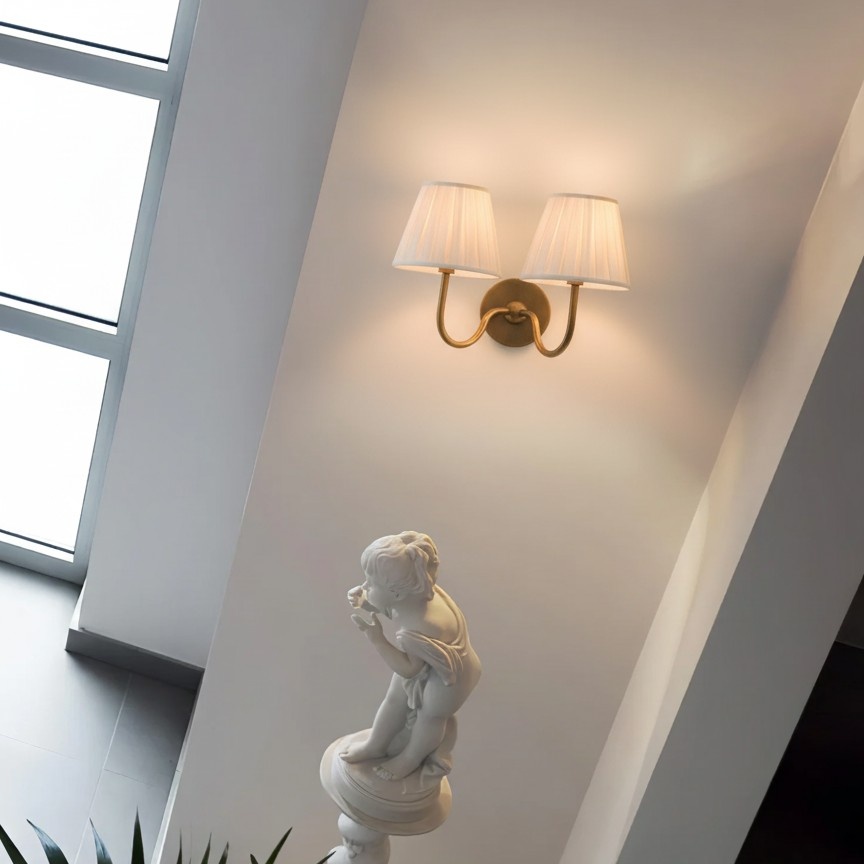 Luvora wall lamp glowing in a corner