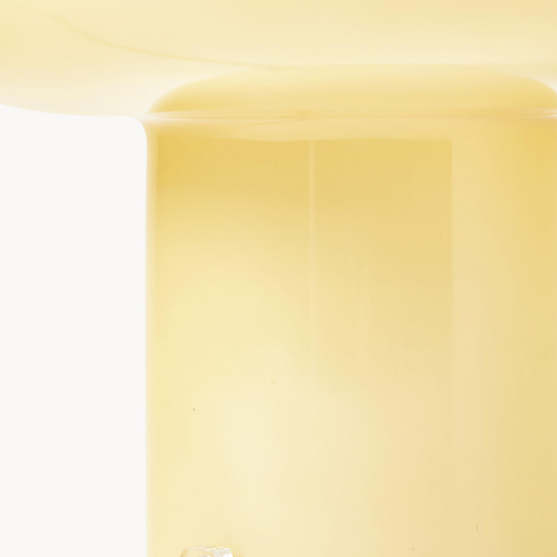 Close-up of glowing opal glass lamp detail
