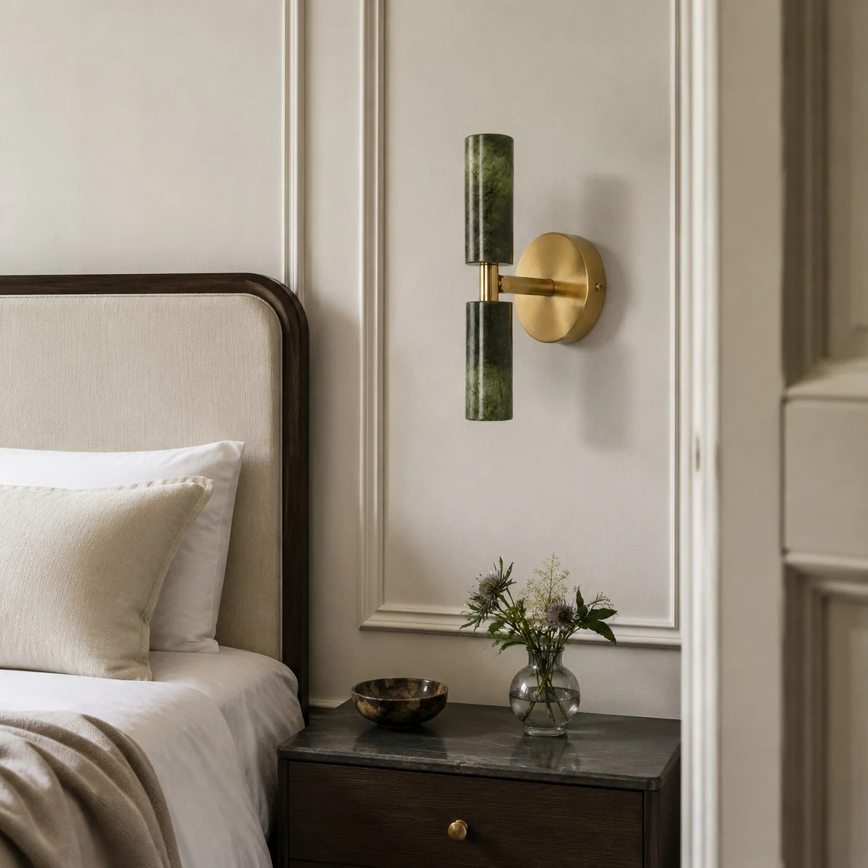 Natural green jade wall sconce installed beside a bed