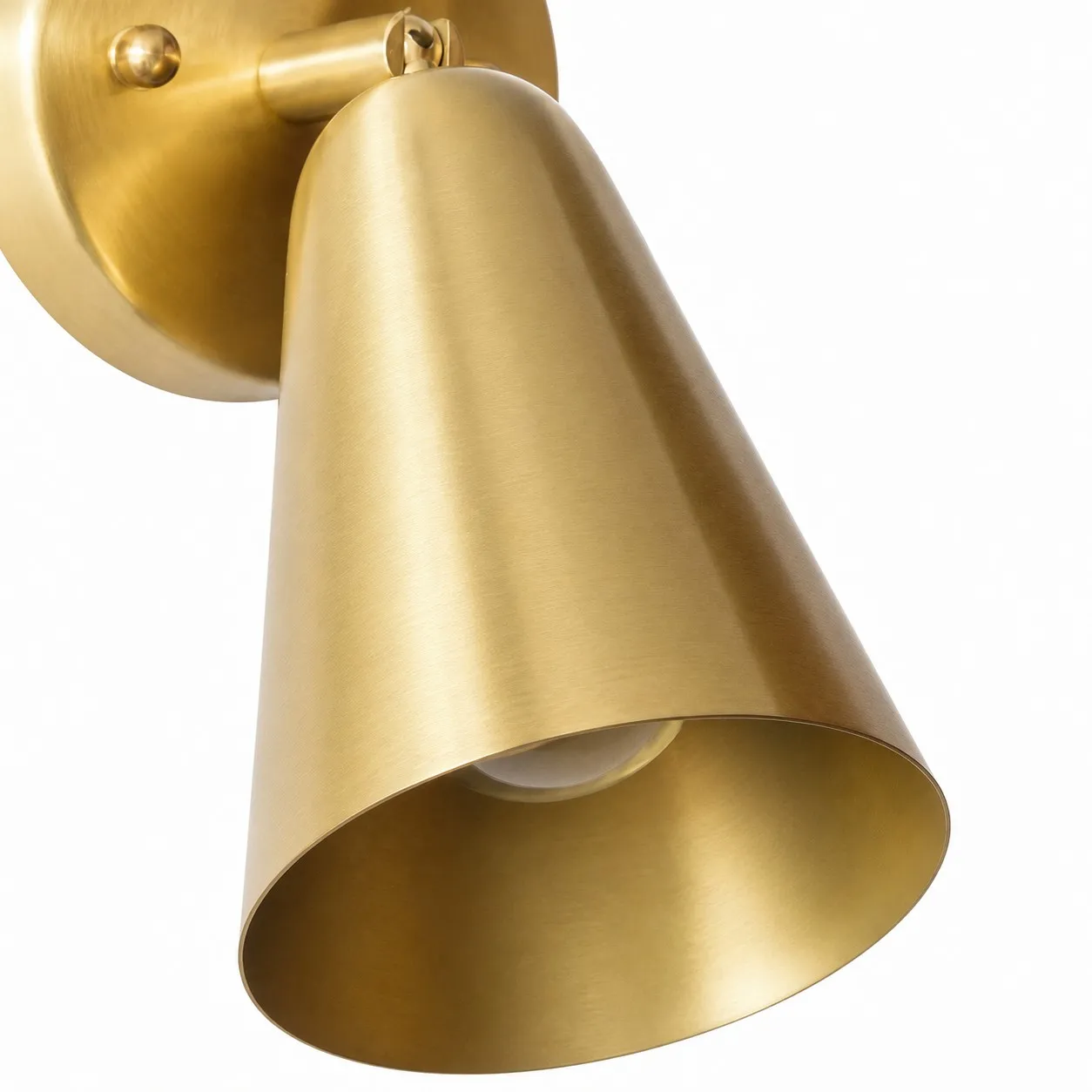 Close-up of natural brass cone shade