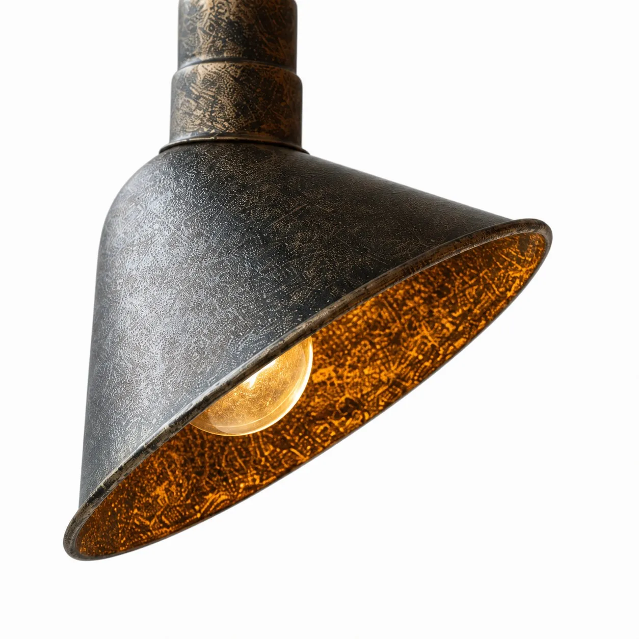 Close view of antique brass cone shade texture
